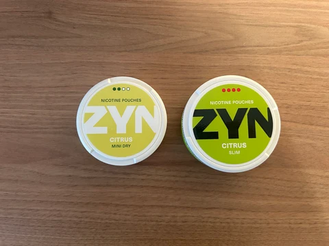 ZYN nicotine pouch strength comparison — Mini Dry and Slim cans showing S1 to S6 strengths with nicotine content in mg per pouch and mg per gram