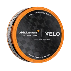 VELO McLaren Spicy Papaya 8mg — tropical papaya with aromatic spice warmth in the 2026 McLaren Circuit Collection. Strong, 11.4mg/g, 20 slim pouches. Limited edition. Tobacco-free. 21+.